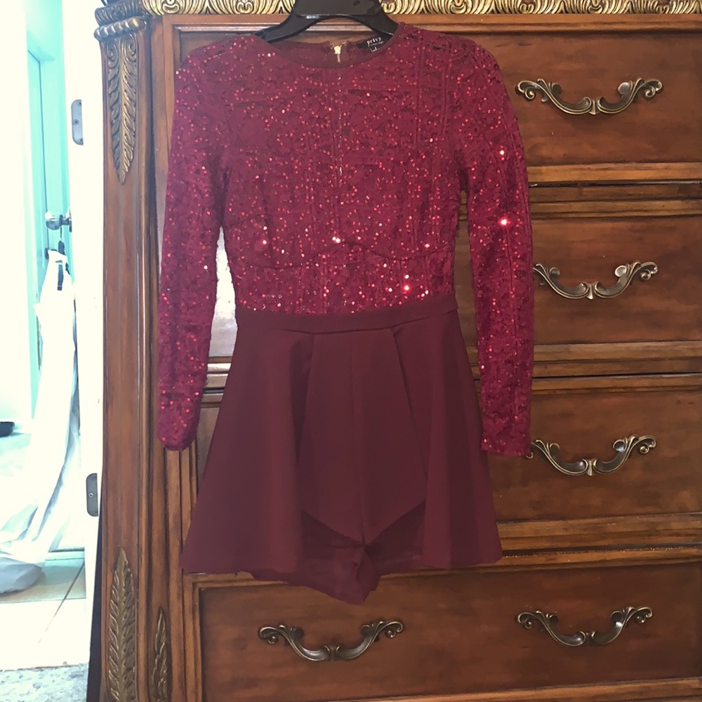 Mauve kids dress that has built in shorts, gold zipper, long sleeve